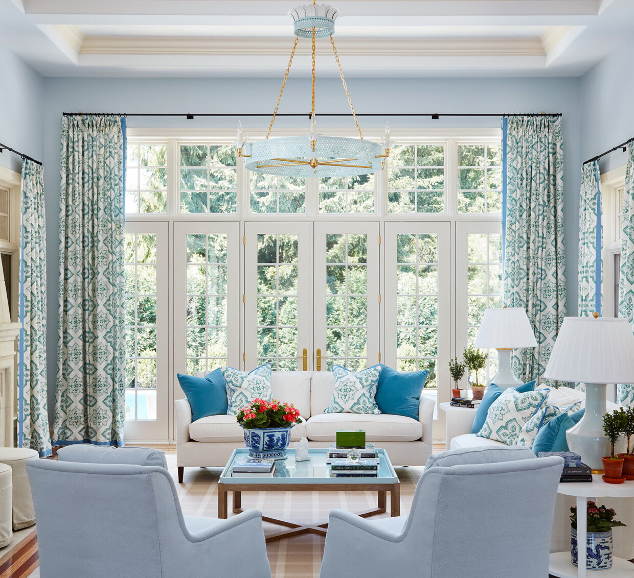 green and blue sunroom designed by Savarie Interirors