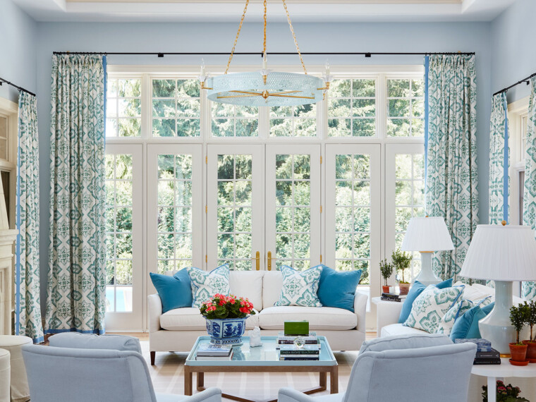 green and blue sunroom designed by Savarie Interirors